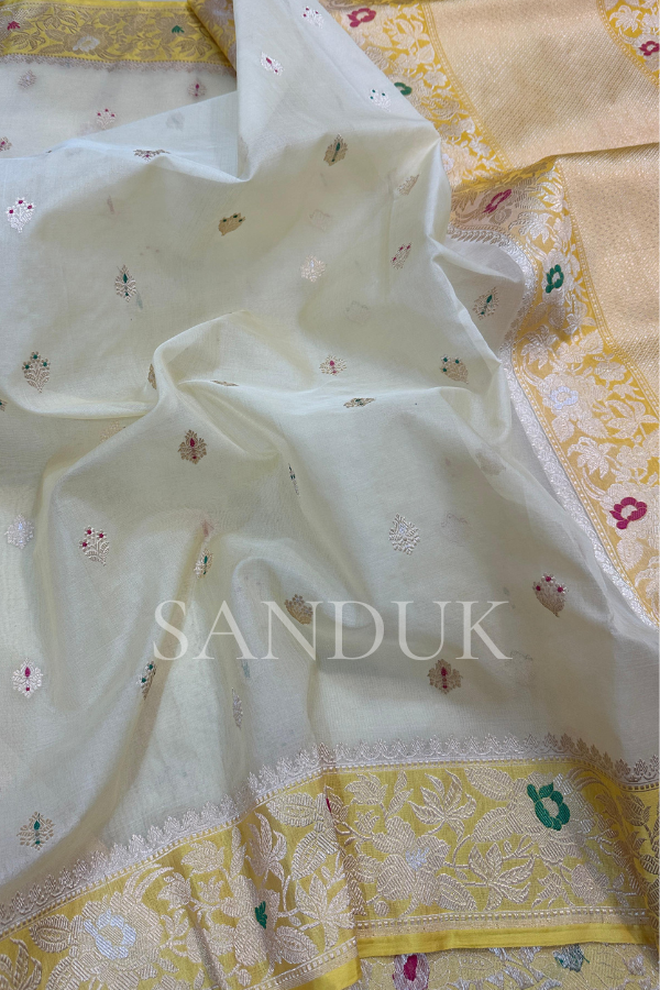 Off white Kadhiyal border tissue silk (Saree)
