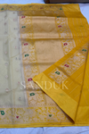 Off white Kadhiyal border tissue silk (Saree)