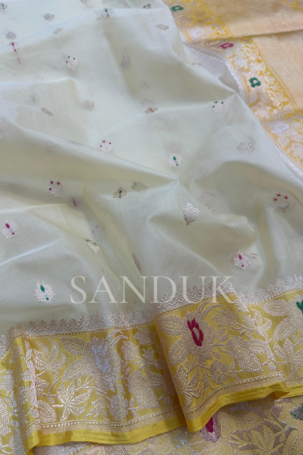 Off white Kadhiyal border tissue silk (Saree)